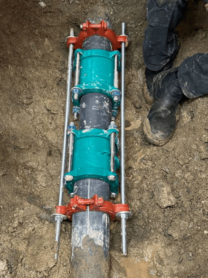 Coupling installed during a buried service repair